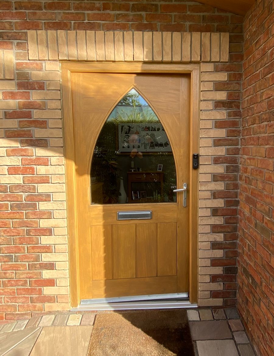 Hardwood Front door in frame